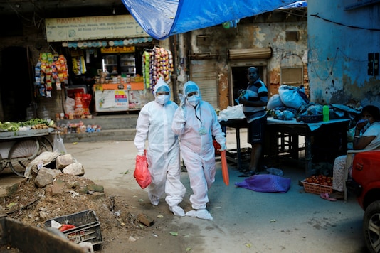 Health workers seen in Delhi. (Reuters)