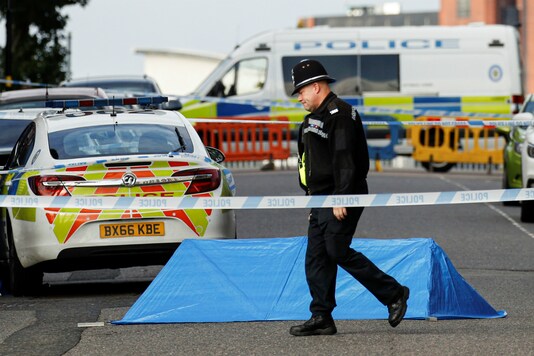 A police officer is seen near the scene of reported stabbings in Birmingham, Britain, on Sunday. (Reuters)