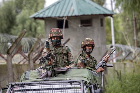 Indian army soldiers standing vigil atop an armored vehicle in Kashmir. (Image for representation)