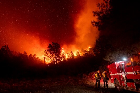 The smoke filled the air with an acrid metallic smell like pennies and spread to nearby states. (File photo: AP Photo/Noah Berger)
