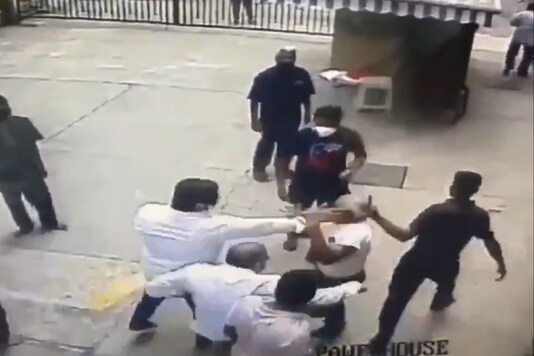 Video capture of CCTV images of the assault on former Navy officer Madan Sharma.  (Image: Twitter / @ DevangVDave)