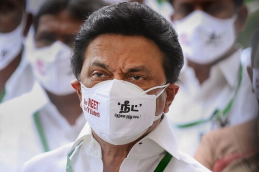 DMK President MK Stalin wearing a face mask with slogan 'Ban NEET, Save TN Students' arrives to attend Tamil Nadu Assembly Session, in Chennai. (PTI Photo) 