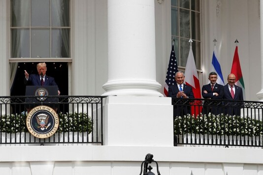 U.S. President Donald Trump speaks prior to signing the Abraham Accords, normalizing relations between Israel and some of its Middle East neighbors in a strategic realignment of Middle Eastern countries against Iran, as Israel's Prime Minister Benjamin Netanyahu, United Arab Emirates (UAE) Foreign Minister Abdullah bin Zayed and Bahrain?s Foreign Minister Abdullatif Al Zayani applaud at the White House in Washington, U.S., September 15, 2020. REUTERS/Tom Brenner