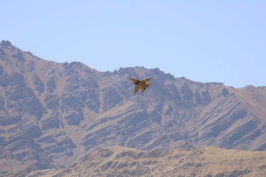 An Indian fighter plane flies over a mountain range in Leh in the Ladakh region September 2, 2020. REUTERS/Stringer