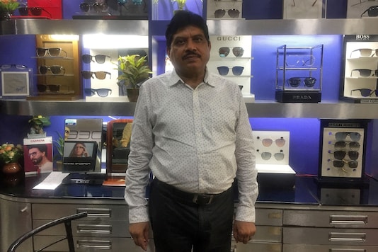 Gajendra Sharma, 53, an optician, poses inside his shop selling eye glasses in Agra, India, September 11, 2020. Picture taken September 11, 2020. REUTERS/Aftab Ahmed Gajendra Sharma, 53, an optician, poses inside his shop selling eye glasses in Agra, India, September 11, 2020. Picture taken September 11, 2020. REUTERS/Aftab Ahmed