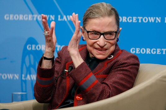 In this April 6, 2018 file photo, Supreme Court Justice Ruth Bader Ginsburg applauds after a performance in her honour at Georgetown Law School in Washington. (AP Photo/Alex Brandon)