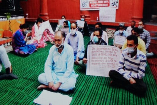 Non-migrant Kashmiri Pandits during a sit-in protest against the government at Ganpatyar, Srinagar.