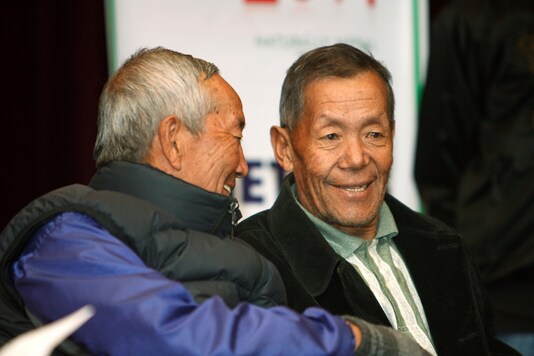 FILE PHOTO: Ang Rita Sherpa (right), who climbed Mount Everest 10 times without the use of supplemental oxygen. (REUTERS/Gopal Chitrakar/File Photo)