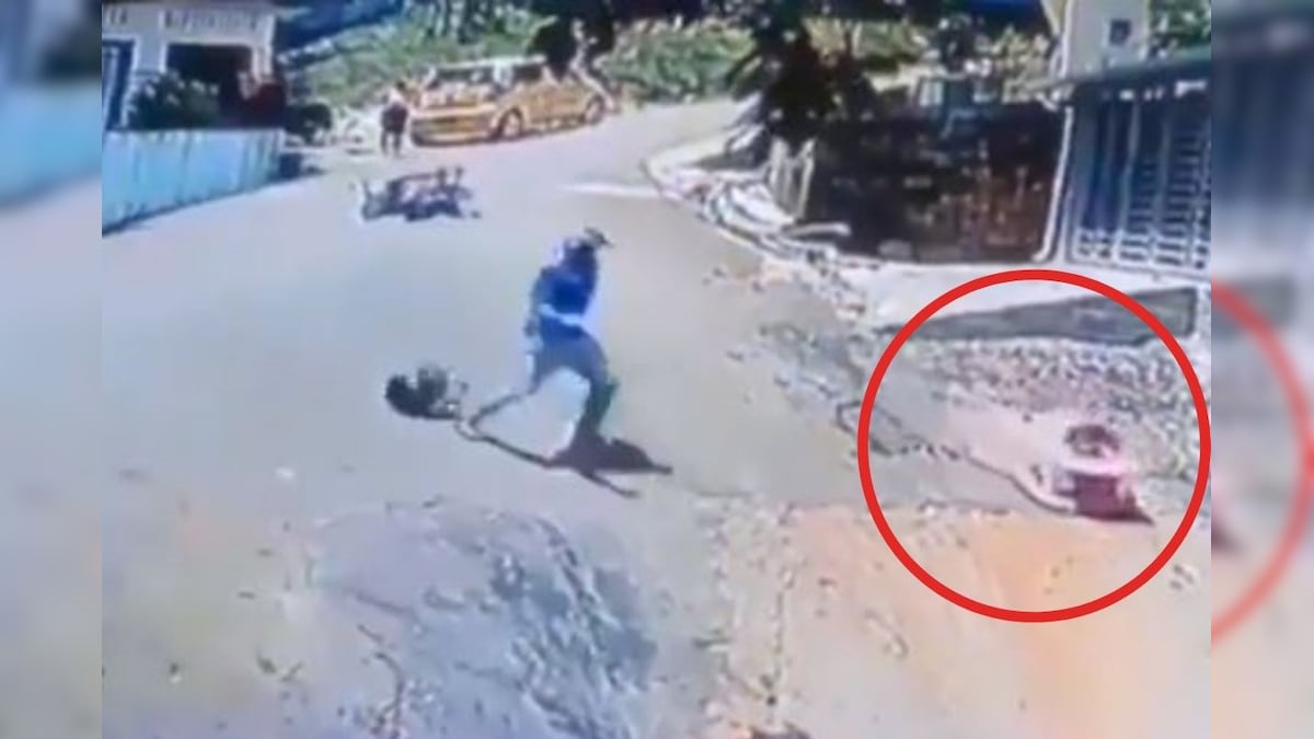 Watch: How This Biker Acts in Time to Save a Baby Rolling Down the Road