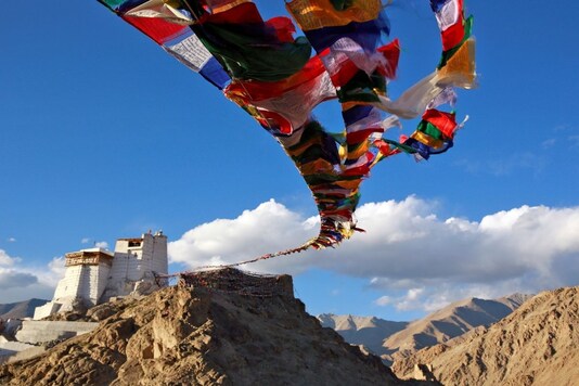 Prayer flags fly at Namgyal Tsemo Monastery above the town of Leh in Ladakh, India September 24, 2016. REUTERS/Cathal McNaughton