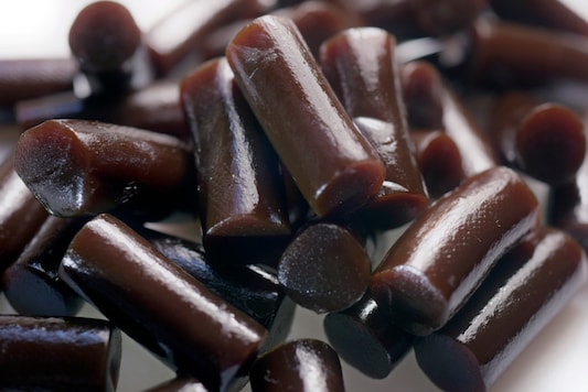 This Wednesday, Sept. 23, 2020 photo shows an arrangement of licorice candy pieces in New York. A Massachusetts construction worker’s love of black licorice wound up costing him his life. Eating a bag and a half every day for a few weeks threw his essential nutrients out of whack and caused the 54-year-old man’s heart to stop, doctors reported Wednesday, Sept. 23, 2020. (AP Photo/Patrick Sison) This Wednesday, Sept. 23, 2020 photo shows an arrangement of licorice candy pieces in New York. A Massachusetts construction worker’s love of black licorice wound up costing him his life. Eating a bag and a half every day for a few weeks threw his essential nutrients out of whack and caused the 54-year-old man’s heart to stop, doctors reported Wednesday, Sept. 23, 2020. (AP Photo/Patrick Sison)