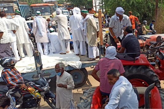 Farmers block the Delhi Meerut highway in Ghaziabad to protest against new farm bills.