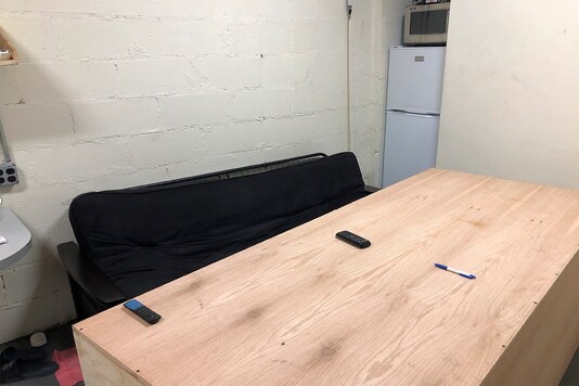 This photo provided by the Office of the MTA Inspector General shows a portion of a storage room converted into a This photo provided by the Office of the MTA Inspector General shows a portion of a storage room converted into a