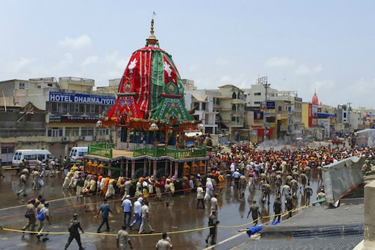 Priests participate in the annual chariot procession of Lord Jagannath in Puri. (AP/File photo)