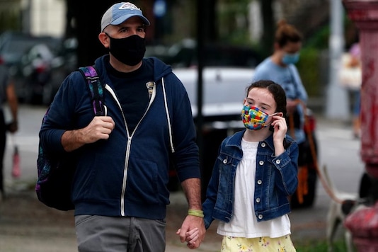 A child walks towards P.S. 130 in the Brooklyn borough of New York City, New York, U.S., September 29, 2020. REUTERS/Carlo Allegri A child walks towards P.S. 130 in the Brooklyn borough of New York City, New York, U.S., September 29, 2020. REUTERS/Carlo Allegri