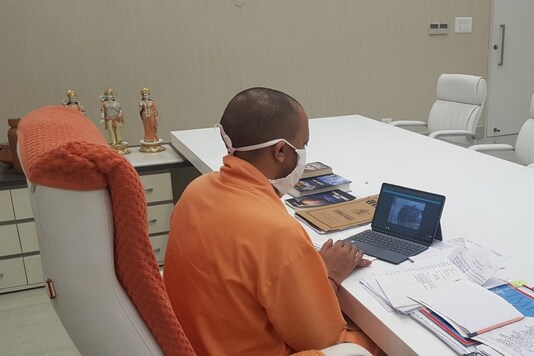 UP CM Yogi Adityanath speaks to the father of Hathras gang-rape victim today.
