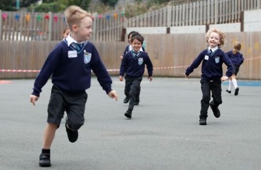 With Hand-wash And Emotional Support, Pupils Return To London School