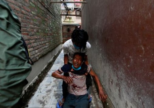 Nepal Police Fire Tear Gas To Stop Religious Rally Amid COVID-19 Surge