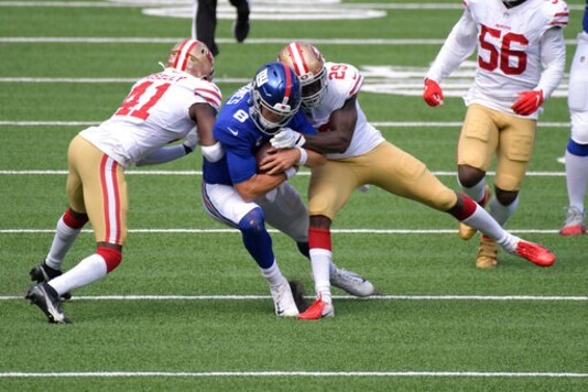 San Francisco 49ers defenders tackle New York Giants quarterback Daniel Jones (8) during the first half of an NFL football game, Sunday, Sept. 27, 2020, in East Rutherford, N.J. (AP Photo/Bill Kostroun) San Francisco 49ers defenders tackle New York Giants quarterback Daniel Jones (8) during the first half of an NFL football game, Sunday, Sept. 27, 2020, in East Rutherford, N.J. (AP Photo/Bill Kostroun)