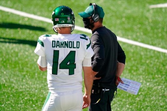 New York Jets head coach Adam Gase, right, talks to quarterback Sam Darnold (14) during the second half of an NFL football game against the San Francisco 49ers, Sunday, Sept. 20, 2020, in East Rutherford, N.J. (AP Photo/Corey Sipkin) New York Jets head coach Adam Gase, right, talks to quarterback Sam Darnold (14) during the second half of an NFL football game against the San Francisco 49ers, Sunday, Sept. 20, 2020, in East Rutherford, N.J. (AP Photo/Corey Sipkin)