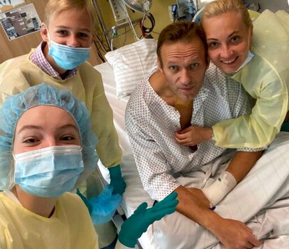 This handout photo published by Russian opposition leader Alexei Navalny on his instagram account, shows himself, centre, and his wife Yulia, right, daughter Daria, and son Zakhar, top left, posing for a photo in a hospital in Berlin, Germany.  Russian opposition leader Alexei Navalny has posted the picture of himself in a hospital in Germany and says he's breathing on his own. He posted on Instagram Tuesday Sept. 15, 2020: 