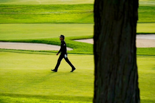Rafael Cabrera Bello, of Spain, walks up the 12th fairway during the second round of the US Open Golf Championship, Friday, Sept. 18, 2020, in Mamaroneck, N.Y. (AP Photo/Charles Krupa)