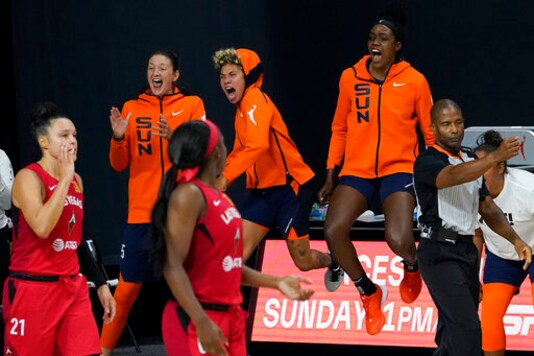 The Connecticut Sun bench celebrates during the second half of Game 3 of a WNBA basketball semifinal round playoff series against the Las Vegas Aces Thursday, Sept. 24, 2020, in Bradenton, Fla. (AP Photo/Chris O'Meara) The Connecticut Sun bench celebrates during the second half of Game 3 of a WNBA basketball semifinal round playoff series against the Las Vegas Aces Thursday, Sept. 24, 2020, in Bradenton, Fla. (AP Photo/Chris O'Meara)