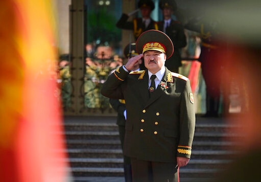 Belarusian President Alexander Lukashenko salutes during his inauguration ceremony at the Palace of the Independence in Minsk, Belarus, Wednesday, Sept. 23, 2020. Lukashenko of Belarus has assumed his sixth term of office in an inauguration ceremony that wasn't announced in advance. State news agency BelTA reported that Wednesday's ceremony is taking place in the capital of Minsk, with several hundred top government official present. (Andrei Stasevich/Pool Photo via AP)