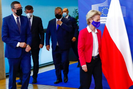 From left, Poland's Prime Minister Mateusz Morawiecki, Czech Republic's Prime Minister Andrej Babis and Hungary's Prime Minister Viktor Orban follow behind European Commission President Ursula von der Leyen prior to a meeting at EU headquarters in Brussels, Thursday, Sept 24, 2020. (Francois Lenoir, Pool via AP)