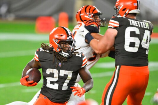 Cleveland Browns running back Kareem Hunt (27) rushes for a 1-yard touchdown during the second half of the team's NFL football game against the Cincinnati Bengals, Thursday, Sept. 17, 2020, in Cleveland. The Browns won 35-30. (AP Photo/David Richard) Cleveland Browns running back Kareem Hunt (27) rushes for a 1-yard touchdown during the second half of the team's NFL football game against the Cincinnati Bengals, Thursday, Sept. 17, 2020, in Cleveland. The Browns won 35-30. (AP Photo/David Richard)
