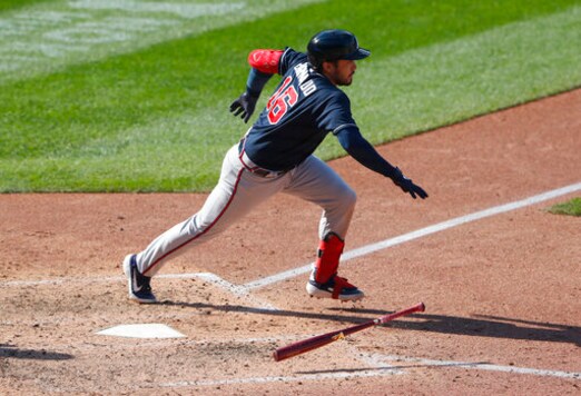 Atlanta Braves' Travis d'Arnaud (16) runs to first base after hitting an RBI-double against the New York Mets during the eighth inning of a baseball game, Sunday, Sept. 20, 2020, in New York. (AP Photo/Noah K. Murray)