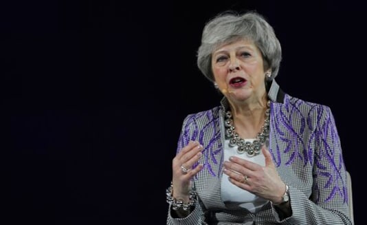 FILE - In this Monday, Feb. 17, 2020 file photo, former British Prime Minister Theresa May speaks at the Global Women's Forum in Dubai, United Arab Emirates. The British government on Monday Sept. 21, 2020, has won over some domestic political opponents of its plan to breach part of the Brexit divorce deal it agreed with the European Union. But former Prime Minister Theresa May has warned that the bill will do untold damage to the U.K. (AP Photo/Kamran Jebreili, File)