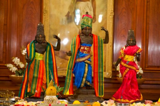 This undated handout photo provided by the Metropolitan Police shows three bronze sculptures, which are being returned to a temple in the Tanjavur District in India, in England. British police say that three historically and religiously important bronze sculptures stolen from a temple in India more than 40 years ago are being returned after specialist detectives took action. Police said Wednesday, Sept. 16, 2020 the idols were taken in 1978 from a temple in the Tanjavur district of Tamil Nadu. (Metropolitan Police via AP)