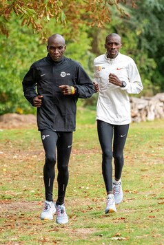 In this image issued by London Marathon Events, Kenya's Eliud Kipchoge, left, trains alongside his pacemaker in the grounds of the official hotel and biosecure bubble in London, Monday Sept. 28, 2020, ahead of the elite-only 2020 London Marathon on Sunday Oct. 4. The 40th Race will take place on a closed-loop circuit around St James's Park in central London. (Bob Martin/London Marathon Events via AP) In this image issued by London Marathon Events, Kenya's Eliud Kipchoge, left, trains alongside his pacemaker in the grounds of the official hotel and biosecure bubble in London, Monday Sept. 28, 2020, ahead of the elite-only 2020 London Marathon on Sunday Oct. 4. The 40th Race will take place on a closed-loop circuit around St James's Park in central London. (Bob Martin/London Marathon Events via AP)