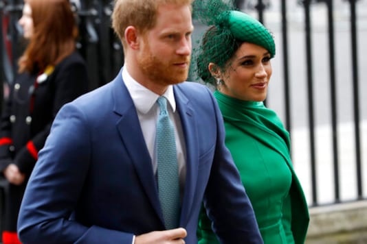 FILE - In this Monday, March 9, 2020 file photo, Britain's Harry and Meghan the Duke and Duchess of Sussex arrive to attend the annual Commonwealth Day service at Westminster Abbey in London. Prince Harry has repaid 2.4 million pounds ($3.2 million) in British taxpayers money that was used to renovate the home intended for him and his wife Meghan before they gave up royal duties. A spokesman on Monday, Sept. 7, 2020 Harry has made a contribution to the Sovereign Grant, the public money that goes to the royal family. (AP Photo/Kirsty Wigglesworth, file)