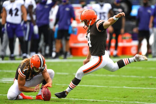 Cleveland Browns place kicker Austin Seibert (4) attempts an extra point in the first half during an NFL football game against the Baltimore Ravens, Sunday, Sept. 13, 2020, in Baltimore. The Browns are replacing kicker Austin Seibert after he missed an extra point and field goal in Sunday's opener, a person familiar with the decision told the Associated Press. Seibert, who clanged his extra point off the left upright and pushed a 41-yard field-goal try to the right, will be replaced by Cody Parkey, said the person who spoke on condition of anonymity because the team has not made the move official. (AP Photo/Terrance Williams, File)