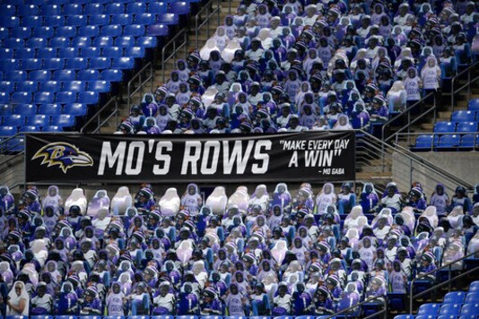 An entire section at the stadium is full of Mo Gaba cutouts during an NFL football game between the Baltimore Ravens and the Cleveland Browns, Sunday, Sept. 13, 2020, in Baltimore. Gaba was a fan of the Baltimore Ravens. (AP Photo/Nick Wass)