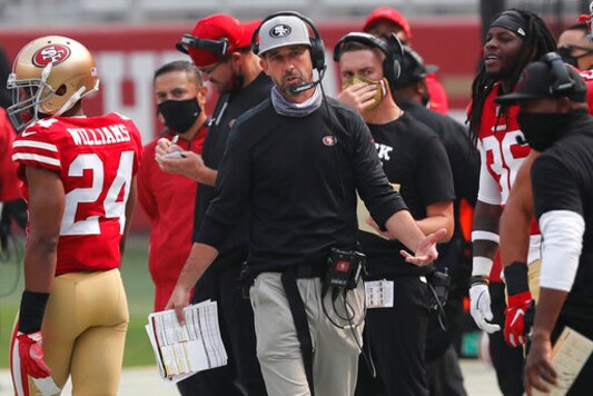 San Francisco 49ers head coach Kyle Shanahan walks on the sideline during the second half of an NFL football game against the Arizona Cardinals in Santa Clara, Calif., Sunday, Sept. 13, 2020. (AP Photo/Josie Lepe)
