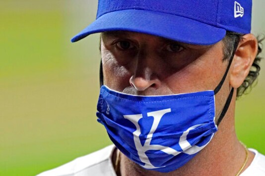 Kansas City Royals manager Mike Matheny walks back to the dugout after making a pitching change during the sixth inning of a baseball game against the St. Louis Cardinals Wednesday, Sept. 23, 2020, in Kansas City, Mo. (AP Photo/Charlie Riedel)