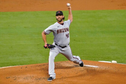 Arizona Diamondbacks starting pitcher Madison Bumgarner throws during the first inning of the team's baseball game against the Los Angeles Angels on Tuesday, Sept. 15, 2020, in Anaheim, Calif. (AP Photo/Ashley Landis)