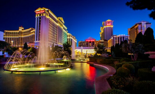 FILE - This June 23, 2019, file photo shows Caesars Palace in Las Vegas. A $17.3 billion buyout creating the world's biggest casino company has final regulatory approval. The New Jersey state Casino Control Commission voted Friday, July 17, 2020 to let Nevada-based Eldorado Resorts acquire Caesars Entertainment Corp. (L.E. Baskow/Las Vegas Review-Journal via AP)
