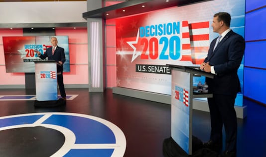 U.S. Sen. Thom Tillis, R-N.C., left, and Democratic challenger Cal Cunningham participate in a televised debate, Monday, Sept. 14, 2020, at the WRAL-TV studios in Raleigh, N.C. (WRAL-TV via AP) U.S. Sen. Thom Tillis, R-N.C., left, and Democratic challenger Cal Cunningham participate in a televised debate, Monday, Sept. 14, 2020, at the WRAL-TV studios in Raleigh, N.C. (WRAL-TV via AP)