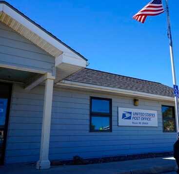 The U.S. Post Office in Nixon, Nev. is seen on Tuesday, Sept. 8, 2020. The majority of the more than 1,300 Pyramid Lake Paiute tribal members receive their mail in shared P.O. boxes at the reservations sole U.S. Post Office in Nixon, Nev., which is only open from 11:00 a.m. to 3:30 p.m. Post offices on tribal lands will play an integral role in ensuring Native Americans can access voting in Nevada and elsewhere in the U.S. West in the 2020 election, but advocates worry residents of sprawling, rural reservations who lack transportation may struggle to get to the post office. (AP Photo/Sam Metz)