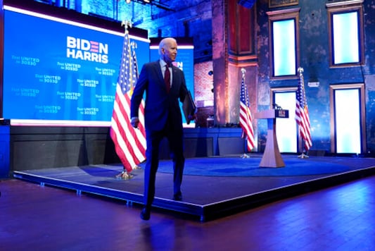 Democratic presidential candidate former Vice President Joe Biden walks off stage after giving a speech on the Supreme Court at The Queen Theater, Sunday, Sept. 27, 2020, in Wilmington, Del. (AP Photo/Andrew Harnik)