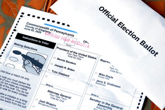 This May 26, 2020 file photo shows an Official Democratic General Primary mail-in ballot and secrecy envelope, for the Pennsylvania primary in Pittsburgh. Philadelphia's top elections official is warning of electoral chaos in the presidential battleground state if lawmakers there do not remove a provision in Pennsylvania law that, under a days-old court decision, requires counties to throw out mail-in ballots returned without secrecy envelopes. (AP Photo/Gene J. Puskar/File)