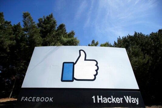 FILE - In this April 14, 2020 file photo, the thumbs up Like logo is shown on a sign at Facebook headquarters in Menlo Park, Calif. As President Donald Trump denies that Russia is interfering in the U.S. election and as he tries to block information to Congress, private companies such as Microsoft and Facebook are stepping into the breach. The private sector has become much more forthcoming about election interference since 2016, providing frequent briefings to key members of Congress. (AP Photo/Jeff Chiu, File)