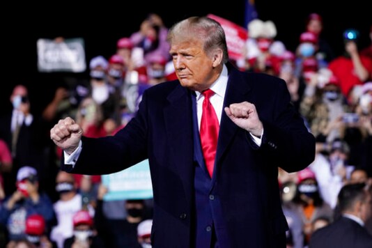 President Donald Trump wraps up his speech at a campaign rally at Fayetteville Regional Airport, Saturday, Sept. 19, 2020, in Fayetteville, N.C. (AP Photo/Evan Vucci