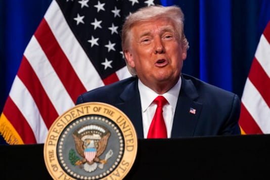 President Donald Trump speaks during a Latinos for Trump event at Trump National Doral Miami resort, Friday, Sept. 25, 2020, in Doral, Fla. (AP Photo/Evan Vucci)