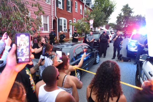People chant during a protest at the scene of a police shooting on Laurel Street and Union Street in Lancaster city on Sunday, Sept. 13, 2020.A man was shot by police earlier in the day after a reported domestic dispute, police said. A Lancaster city police officer fired at a 27-year-old man who was armed with a knife. The man, identified as Ricardo Munoz, was killed and pronounced dead at the scene, (Andy Blackburn/LNP/LancasterOnline via AP) People chant during a protest at the scene of a police shooting on Laurel Street and Union Street in Lancaster city on Sunday, Sept. 13, 2020.A man was shot by police earlier in the day after a reported domestic dispute, police said. A Lancaster city police officer fired at a 27-year-old man who was armed with a knife. The man, identified as Ricardo Munoz, was killed and pronounced dead at the scene, (Andy Blackburn/LNP/LancasterOnline via AP)