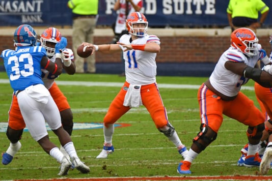 Florida quarterback Kyle Trask (11) releases a pass during the first half of an NCAA college football game against Mississippi in Oxford, Miss., Saturday, Sept. 26, 2020. (AP Photo/Thomas Graning) Florida quarterback Kyle Trask (11) releases a pass during the first half of an NCAA college football game against Mississippi in Oxford, Miss., Saturday, Sept. 26, 2020. (AP Photo/Thomas Graning)